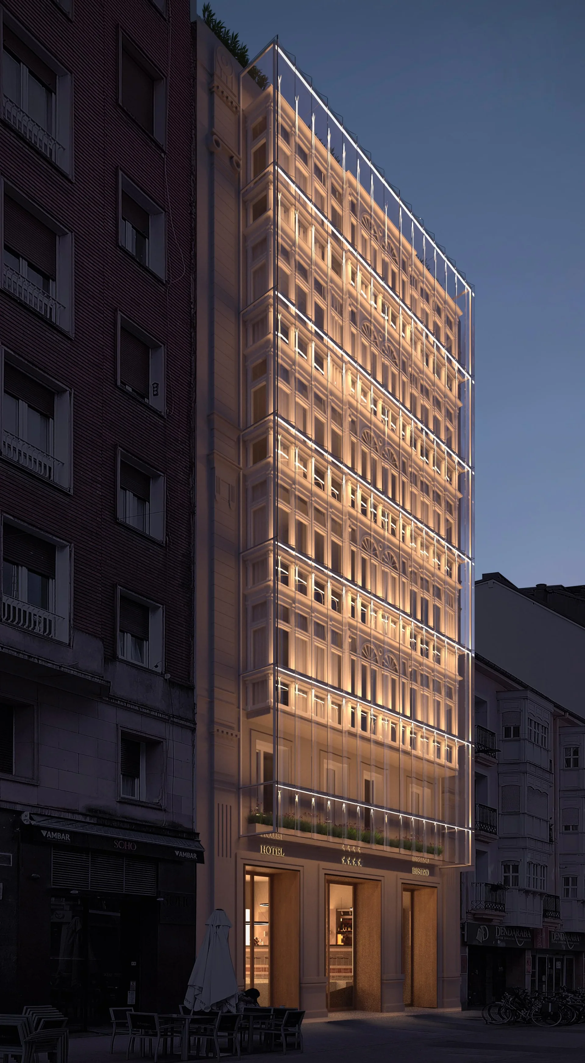 Fachada del Hotel Postas iluminada al anochecer